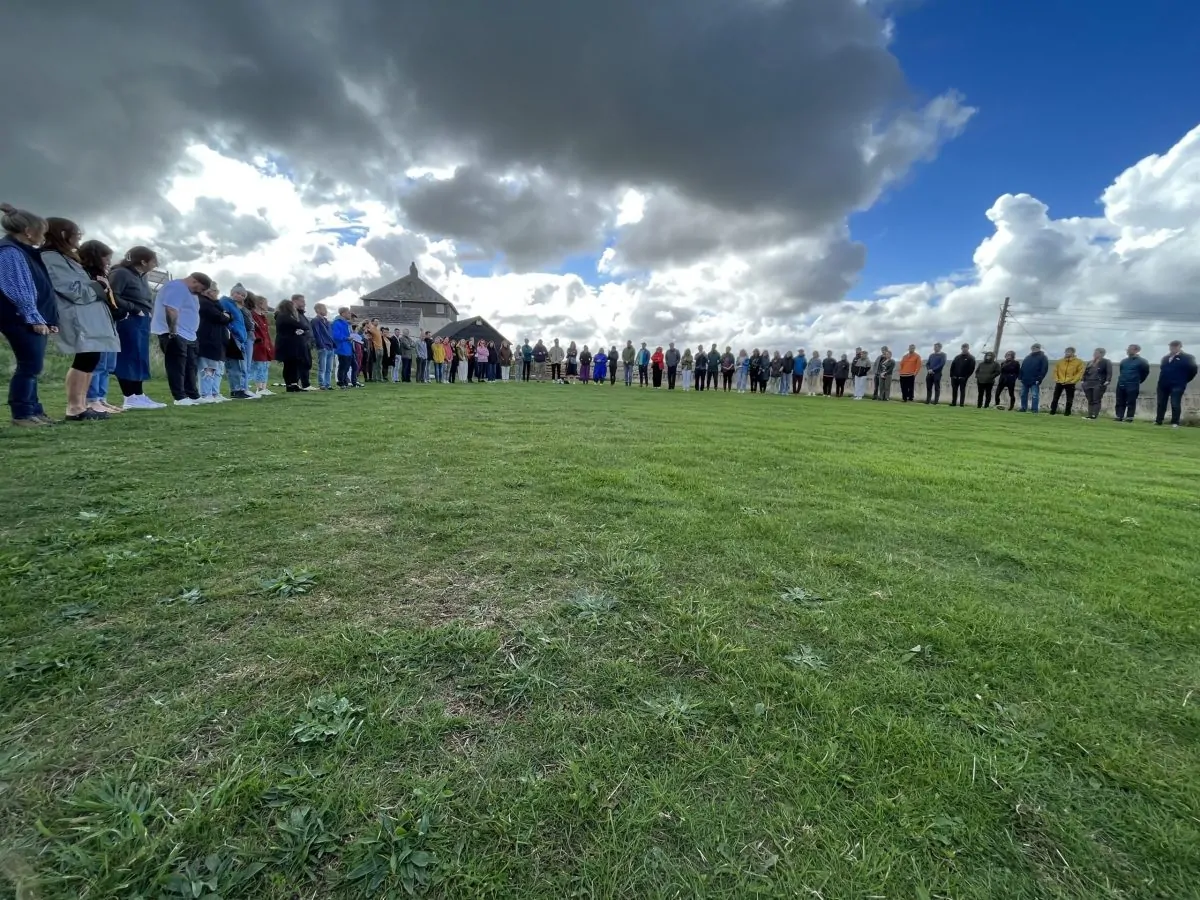 The audience gathers outside for a session at Goodfest 2022
