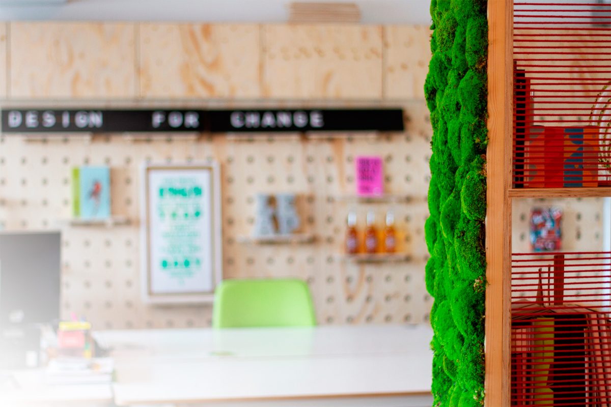 interior of Leap studio featuring living moss wall