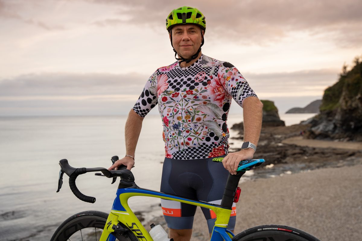 matt standing next to his bike preparing for ride the change to cop26