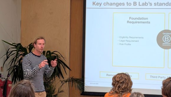 Simon presenting new B Corp standards to a room full of people at a B Local event at the Lost Gardens of Heligan