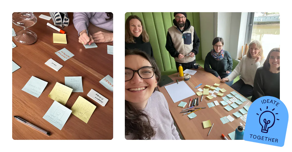 team around table with post-its on